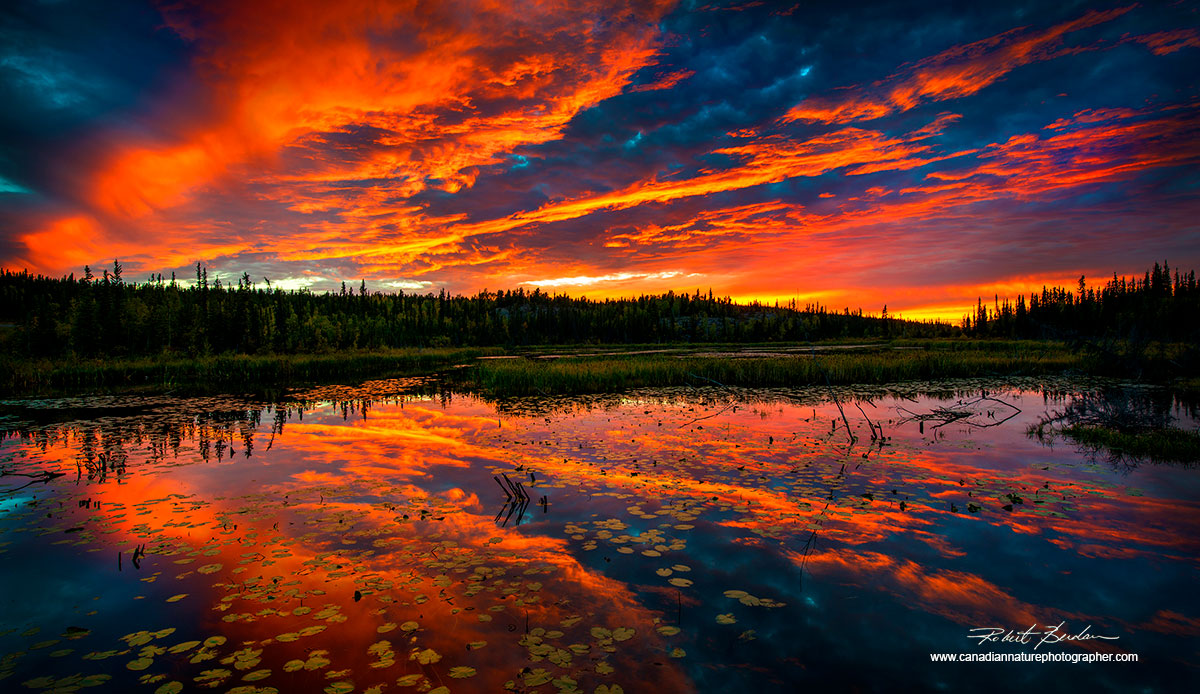 Sunset on pond along the Ingraham trail outside of Yellowknife,NT by Robert Berdan ©