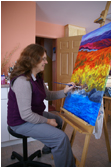 Ann Timmins painting in her Studio ©
