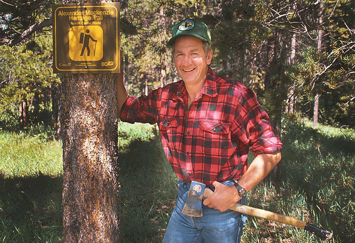 Hälle Flygare standing next to the Alexander Mackenzie Heritage Trail sign