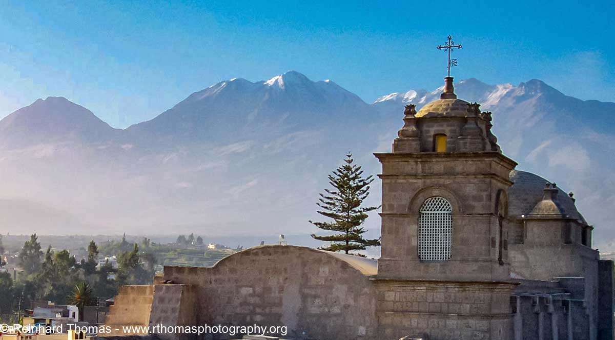 Arequipa church with volcano in the background by Reinhard Thomas ©