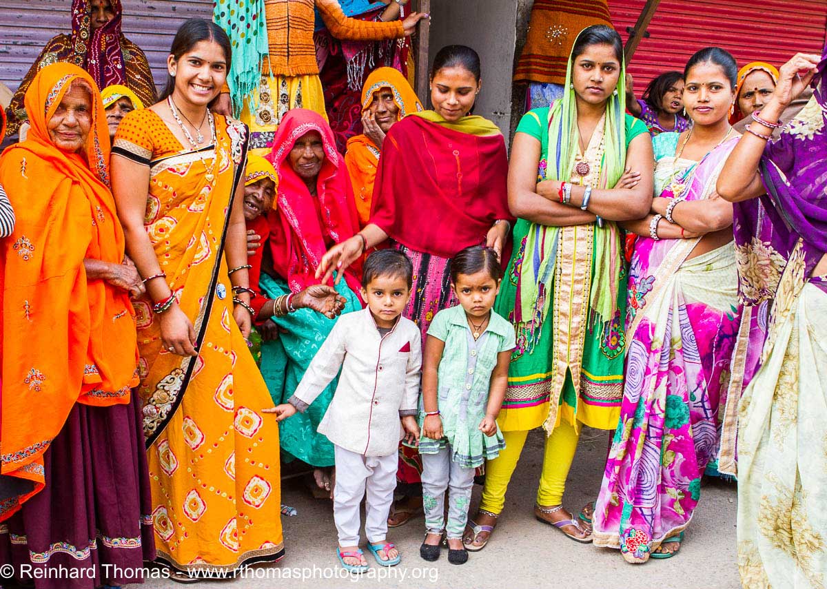 Three generations in colorfull dresses India by Reinhard Thomas ©