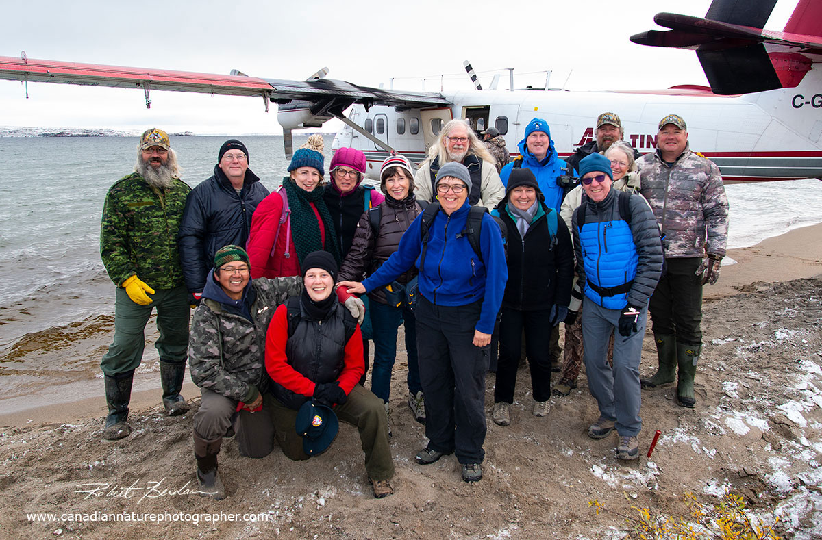 First Group of photographers and guides pose before boarding the Twin Otter for Yellowknife by Robert Berdan ©