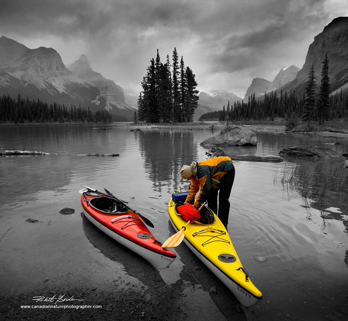 Bright colour of these kayaks pop out of the background which I made black and white to enhance the effect. Spirit Island, Jasper National Park, AB  by Robert Berdan ©