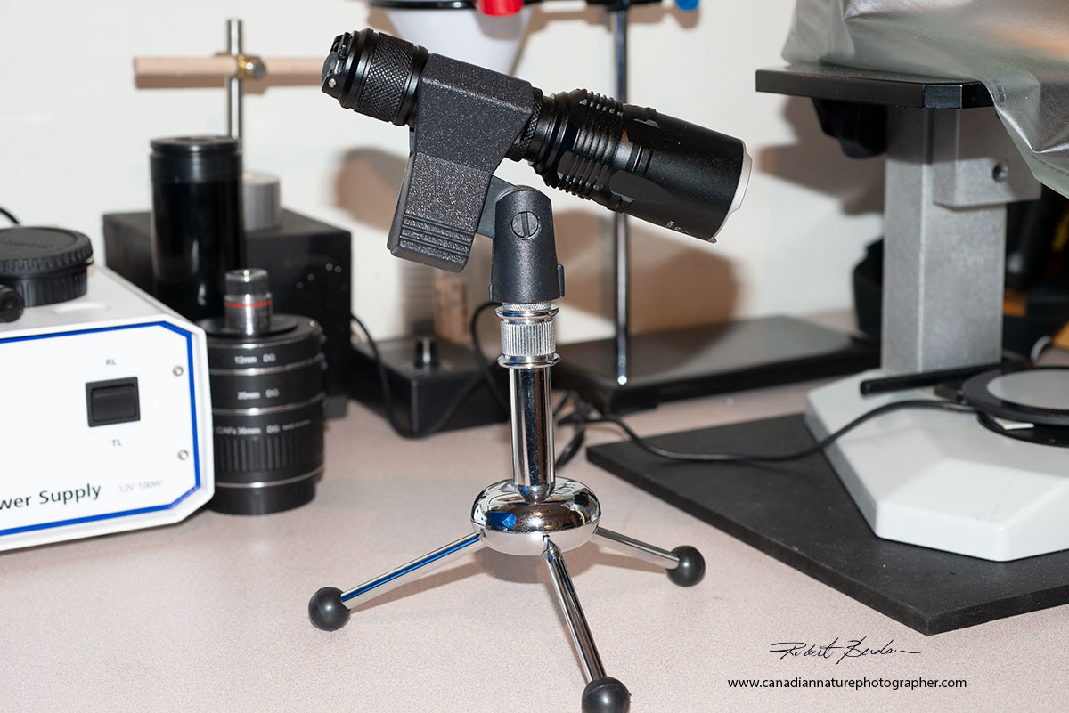 Nitecore Flashlight which provides up to 2800 lumen on a table top microphone stand by Robert Berdan ©