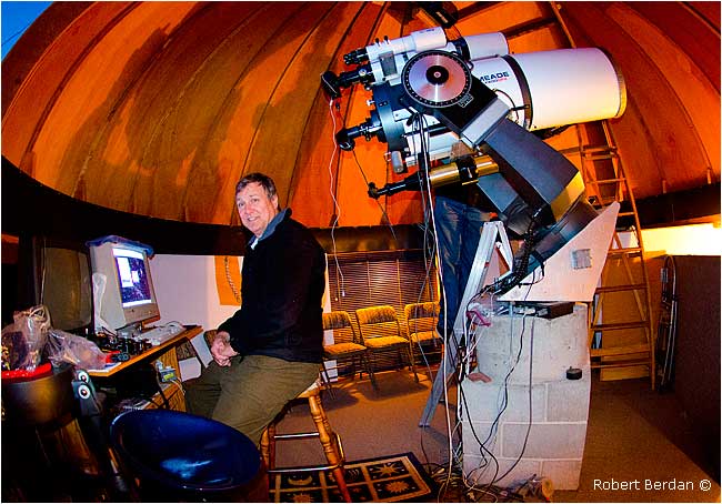 Robert Berdan sitting in front of computer in Jack Newton's observatory ©